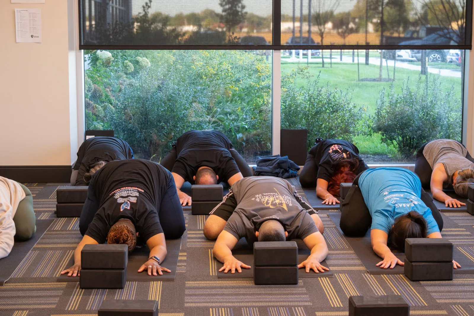 Group of yoga students from YFFR Instructor School practicing child's pose